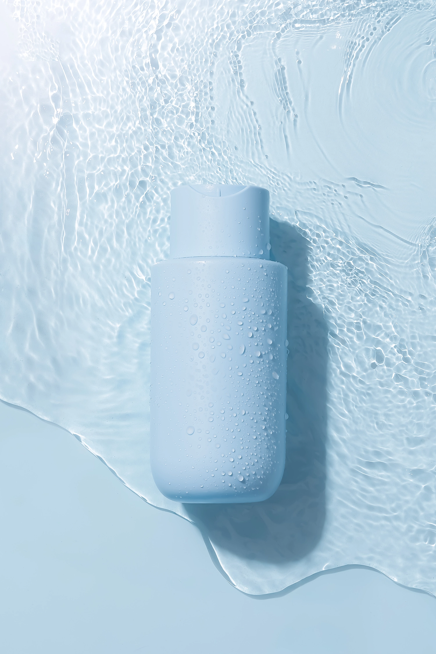 Light blue plain vinyl backdrop for product photography