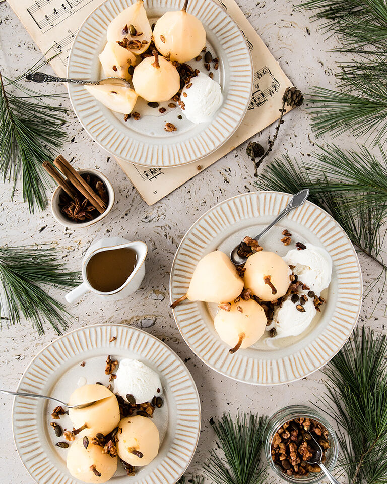 Prosecco pears with ice cream and caramelized nuts