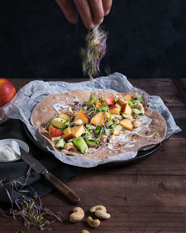 Easy vegan wrap with nectarine and cashews