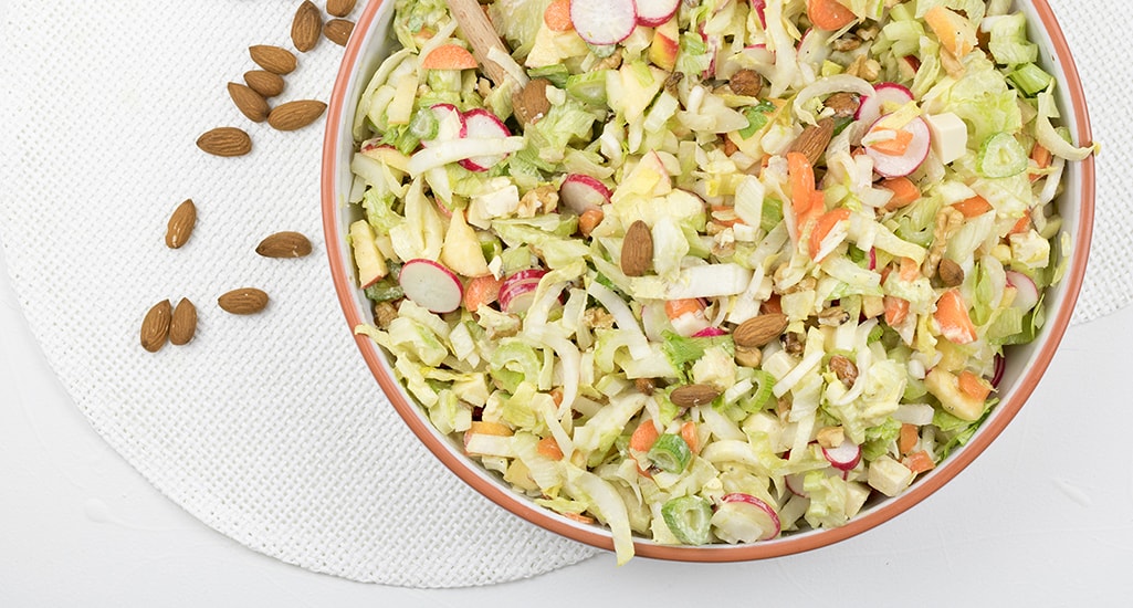 Chicory salad with fennel, carrot, radish and celery photographed from above