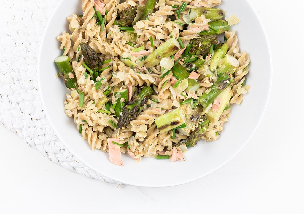 Grilled green asparagus with pasta photographed from above