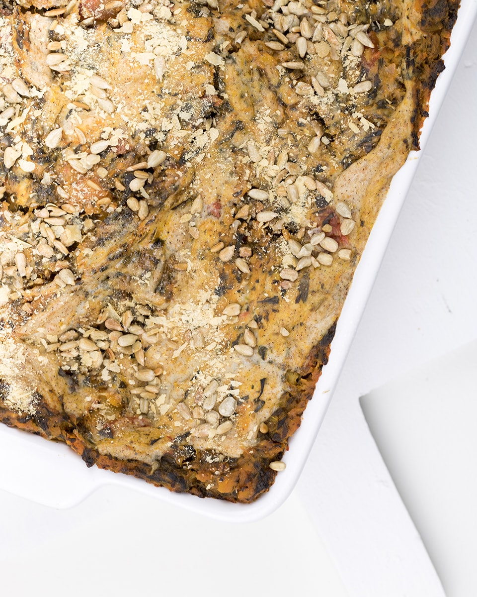 Lasagna with pumpkin, spinach and tomato sauce; vegan food