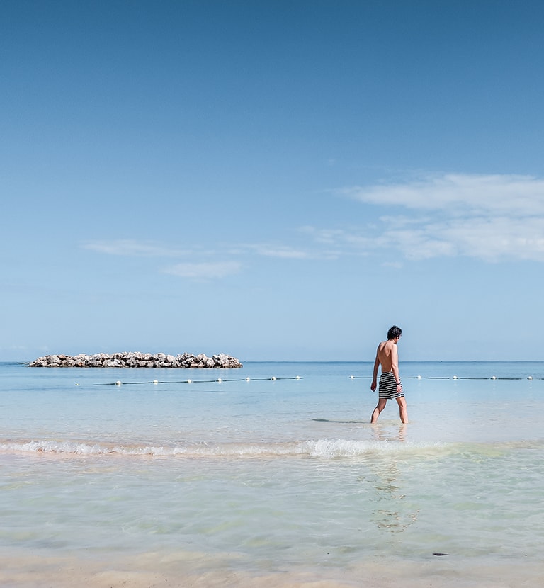 Beach at Dunn’s River Falls park, Ocho Rios, Jamaica