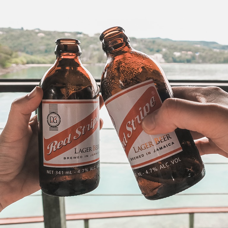 Drinking Red Stripe at James Bond Beach, Jamaica