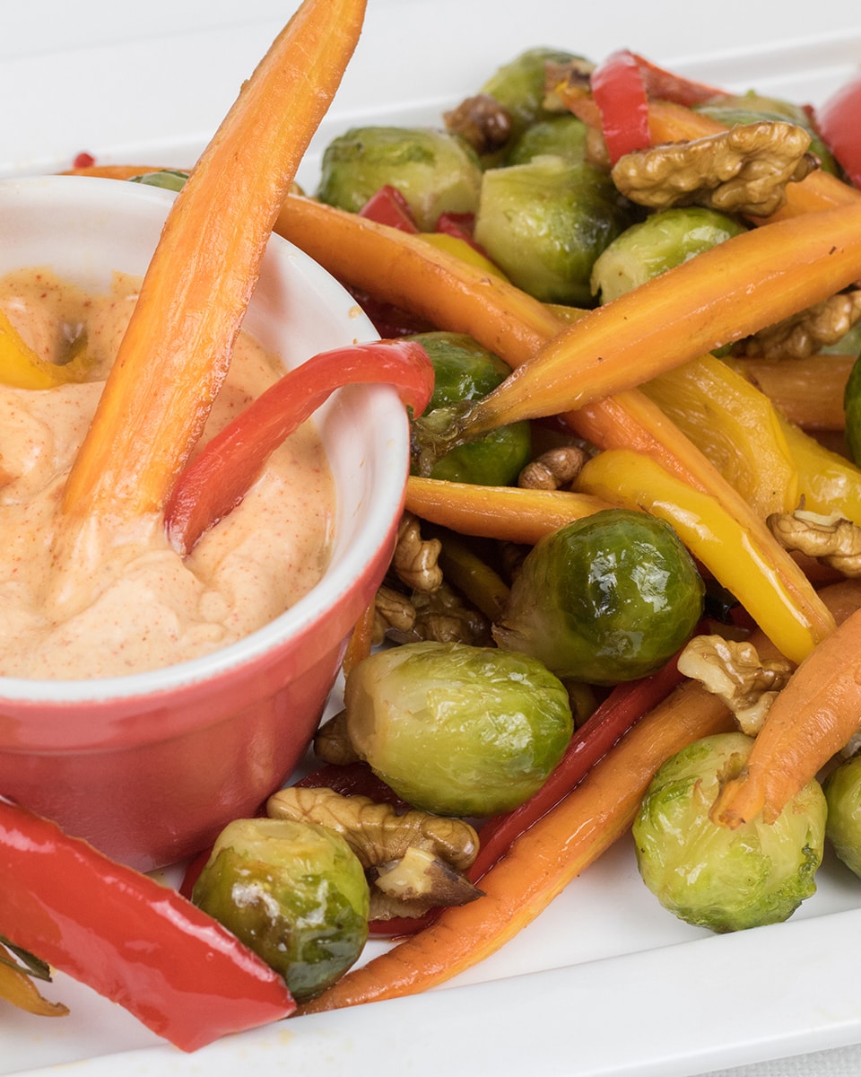 Oven baked brussels sprouts, carrots, walnuts and sauce
