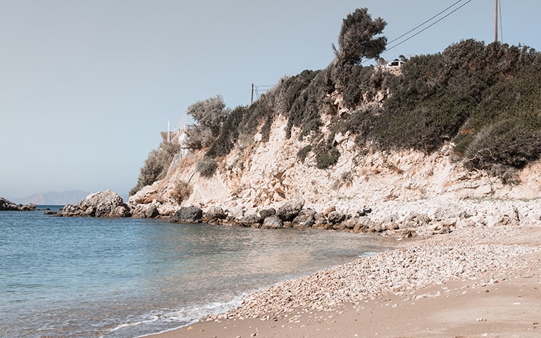 Chrisopetro restaurant settled on the rocks, Samos, Greece