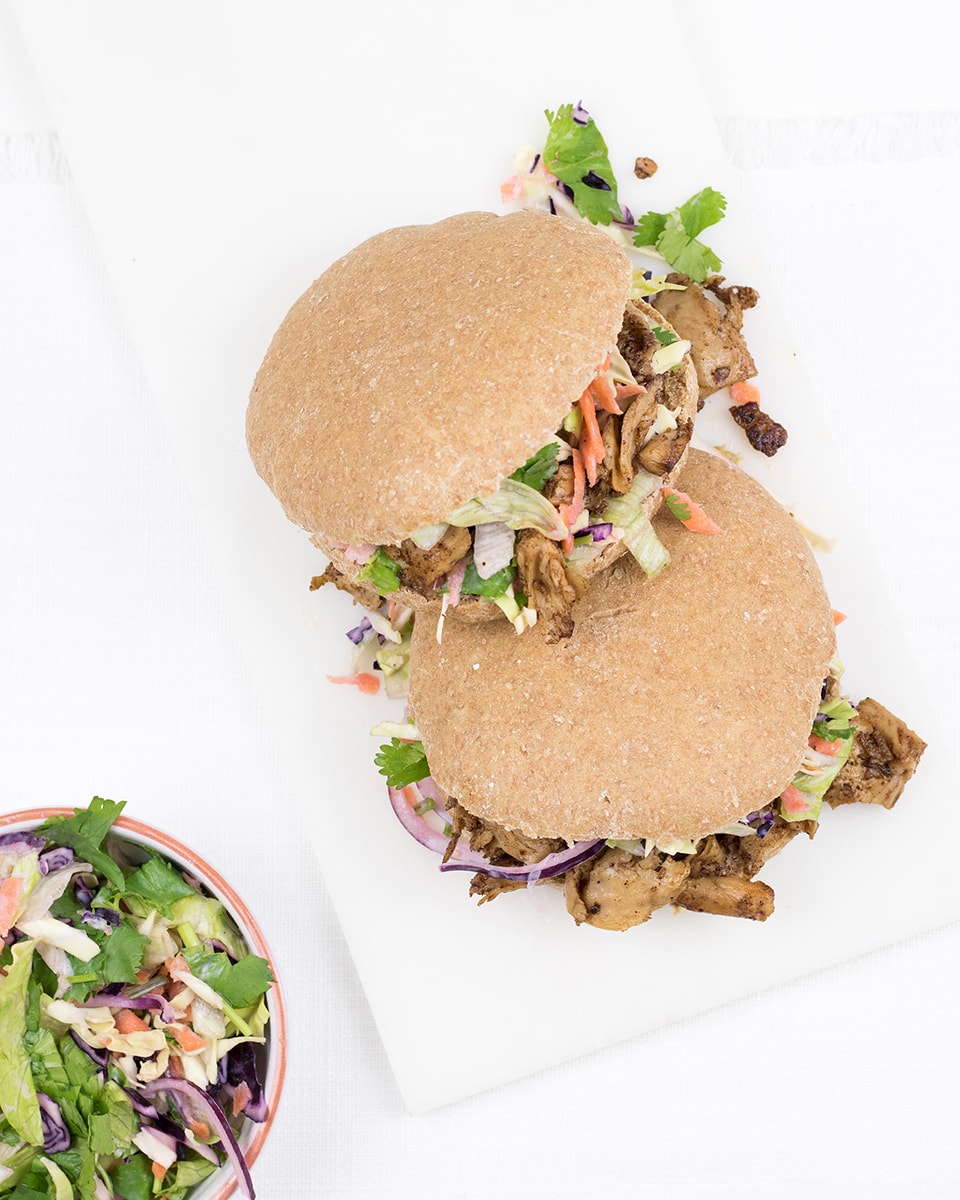 Vegan jerk chicken, stuffed whole grain pita with healthy salad