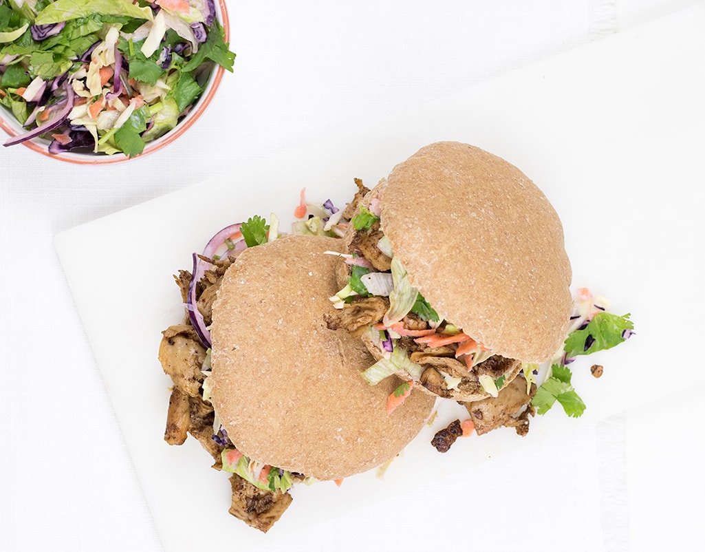 Stuffed pitas with vegan jerk photographed from above