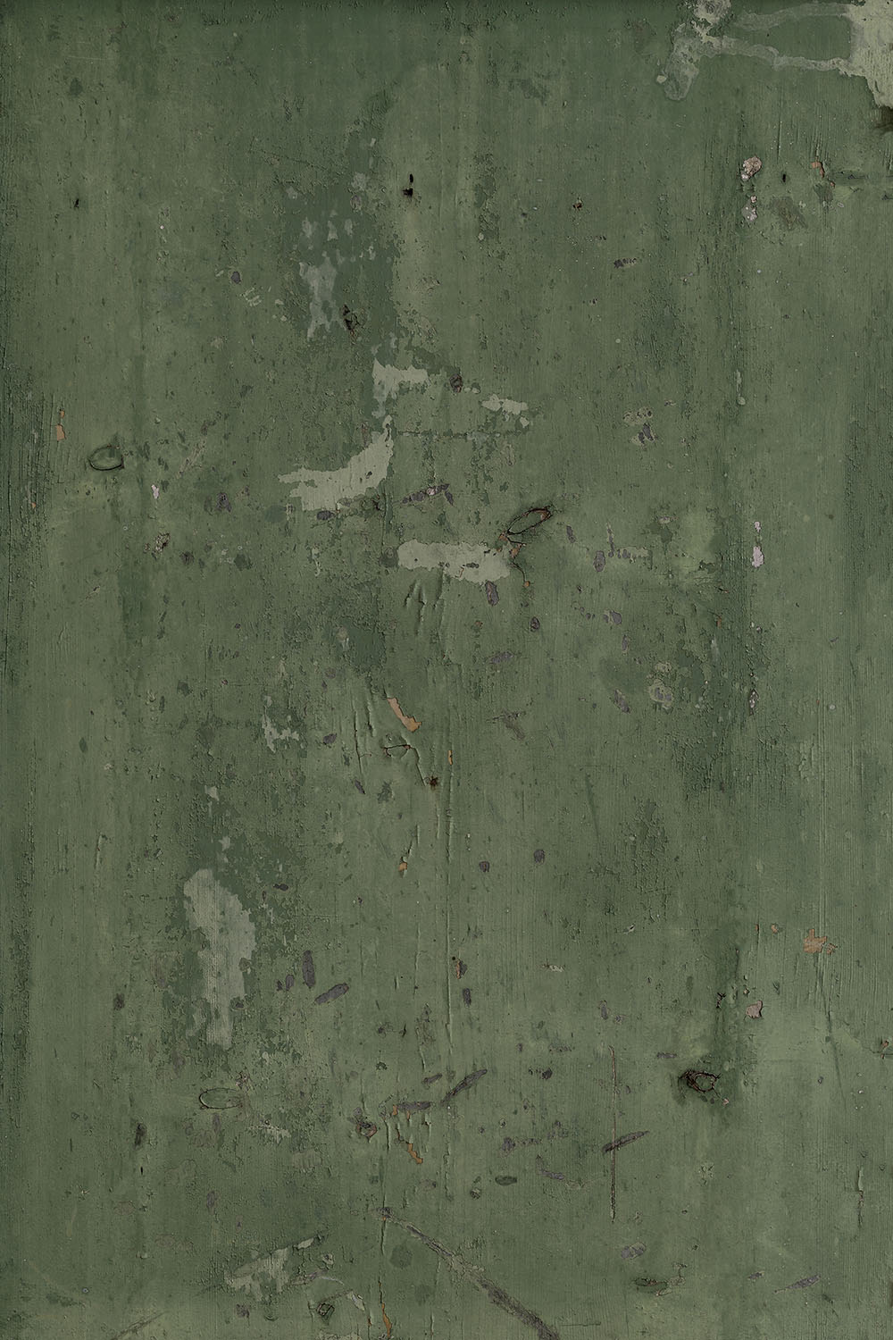 Green weathered wood backdrop with distressed paint