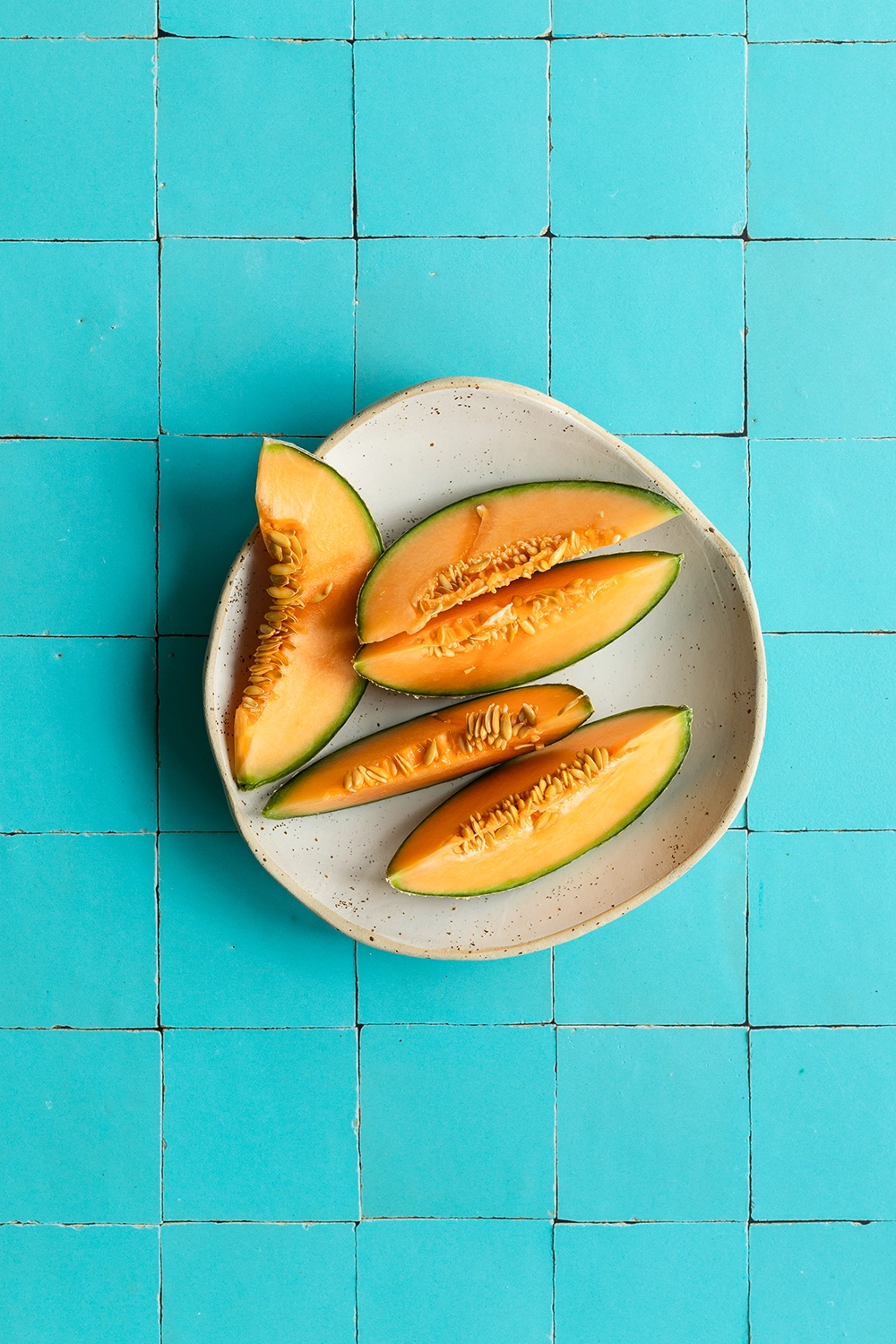 Photography background with printed tile pattern in Bahamas blue