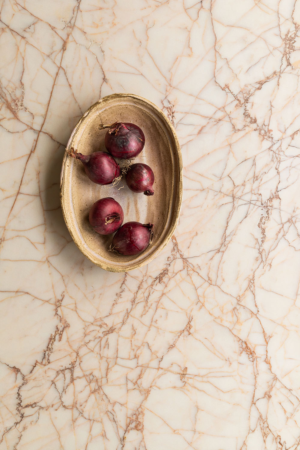Beige marble shooting surface for food photography