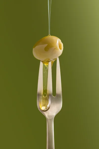 Solid olive color surface for flat lay styling and product photography
