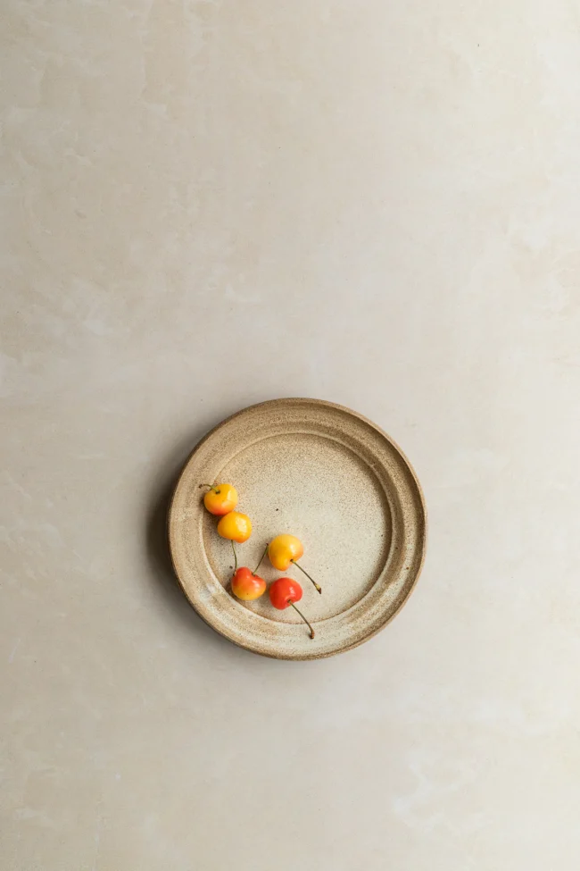 Beige plaster photography backdrop for styling food and brands