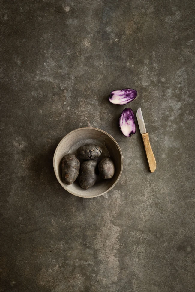 Dark and moody styling surface for professional studio photography